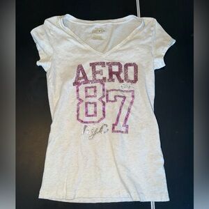 Aeropostale Cream Tee with Purple Graphic